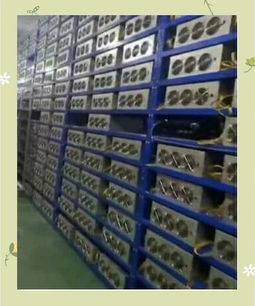 Rows of mining rigs in a climate-controlled environment